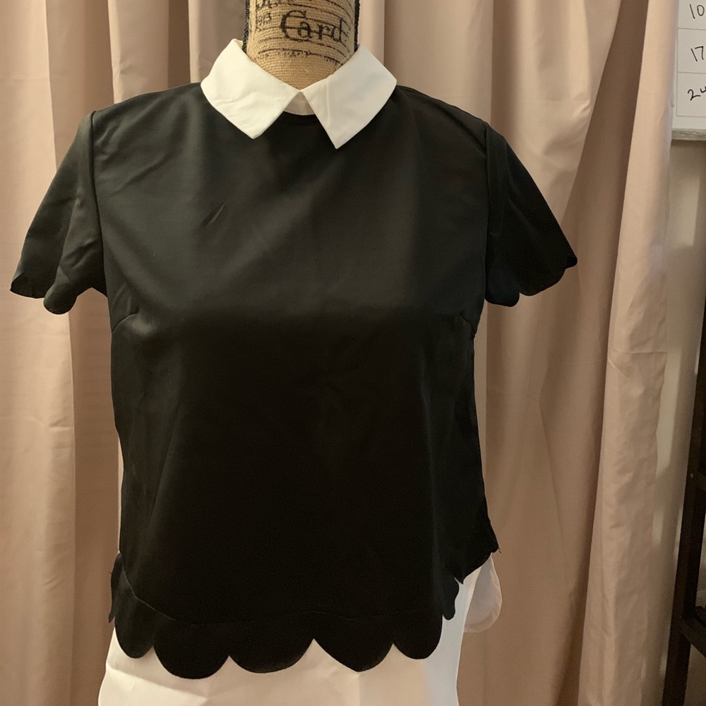 Black shirt with white ruffles in Size Small